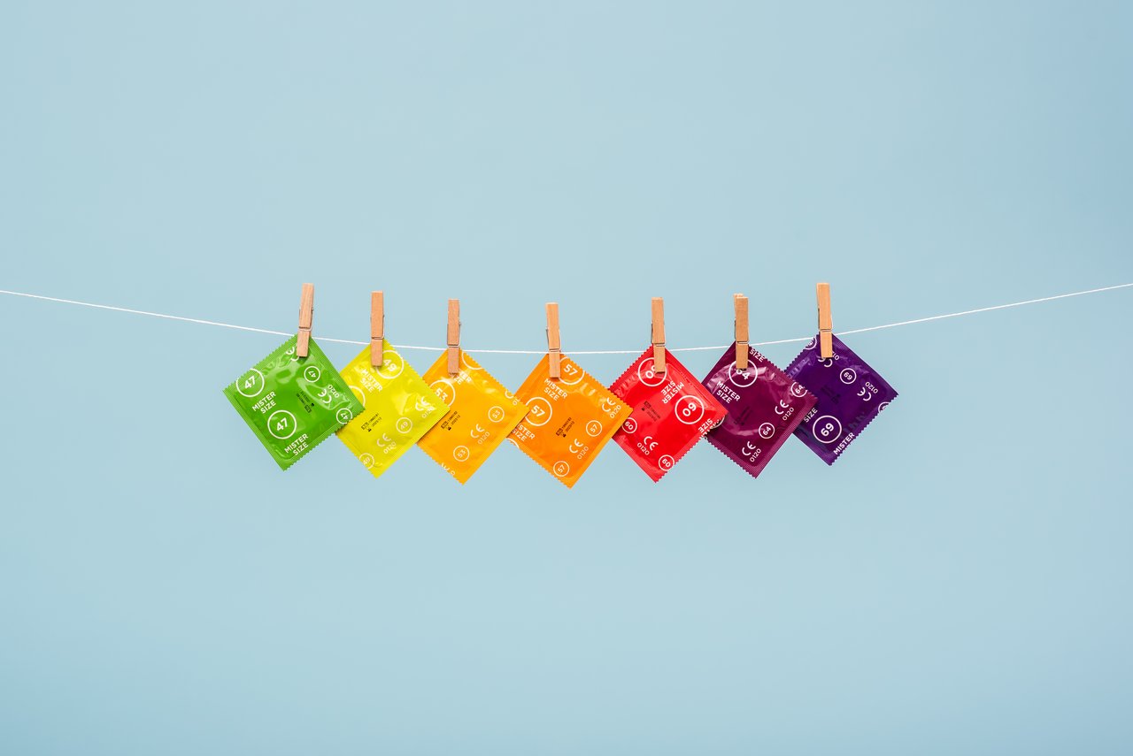7 different sizes of condoms from Mister Size on clothesline